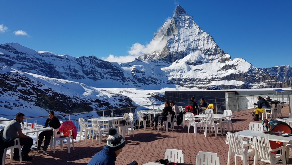 Socially distanced tables at Trockener Steg under the Matterhorn.