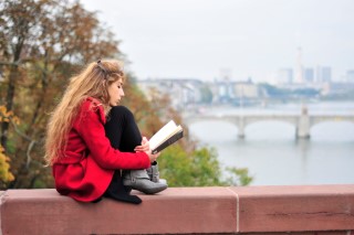 A Girl Reading a Poem